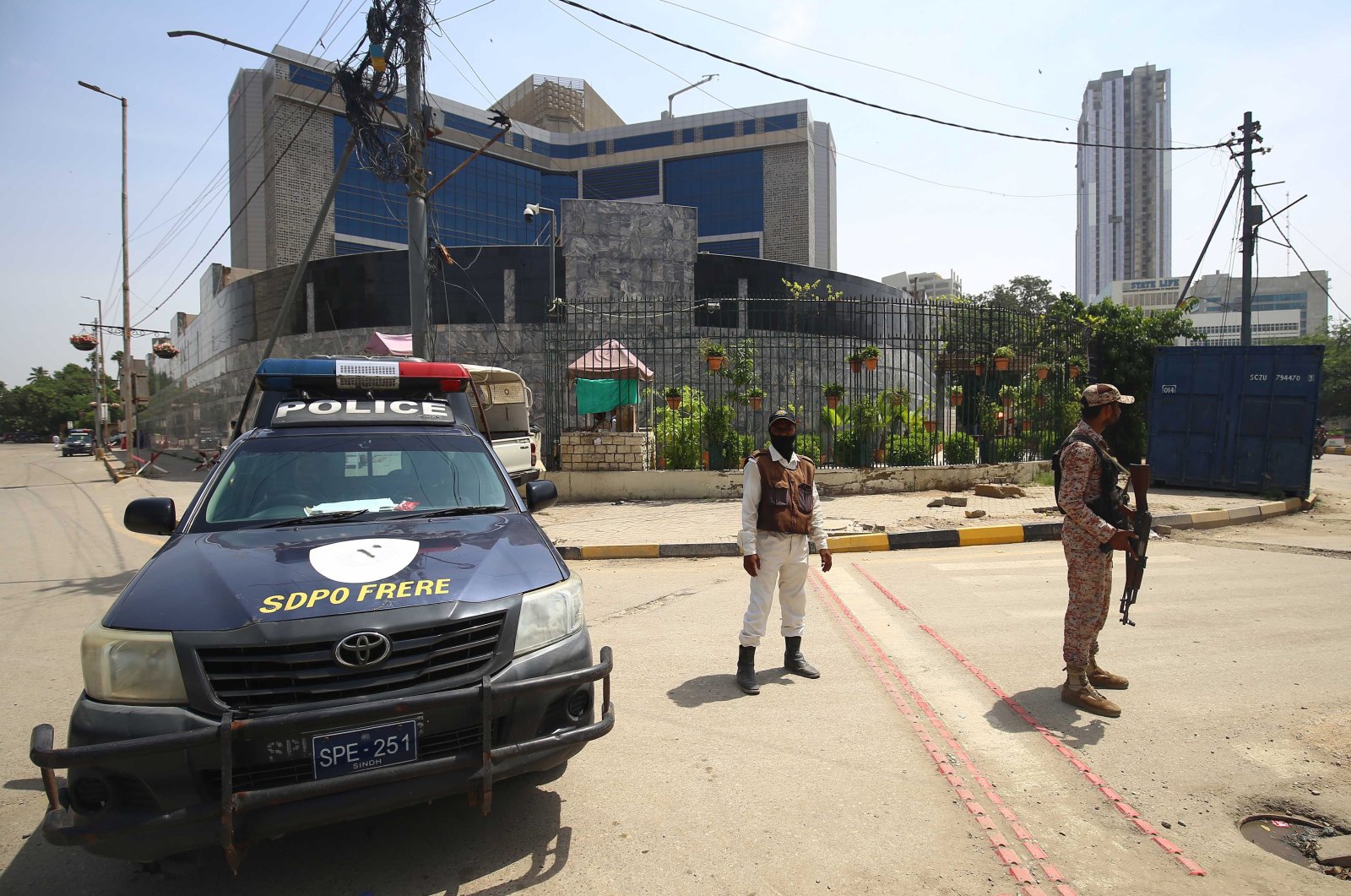 Pakistani security officials stand guard in front of the England team hotel, Karachi, Pakistan, Sept. 15, 2022. (EPA Photo)
