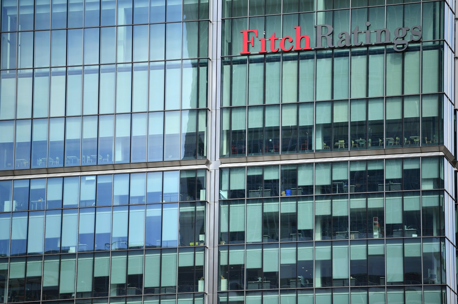 The offices of the Fitch Ratings building appear empty in Canary Wharf, London, Britain, May 27, 2020. (Reuters Photo)