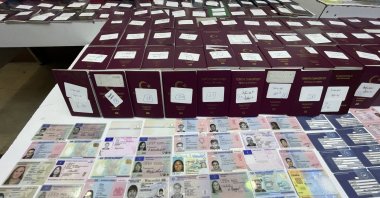 Passport and IDs recovered by police in Istanbul, Türkiye, Sept. 16, 2022. (AA Photo)