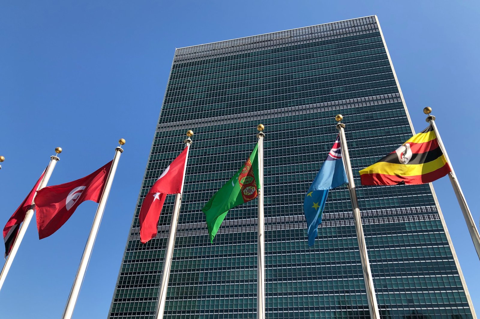 Flags fly outside the United Nations headquarters during the 74th session of the United Nations General Assembly, New York, U.S., Sept. 28, 2019. (AP Photo)