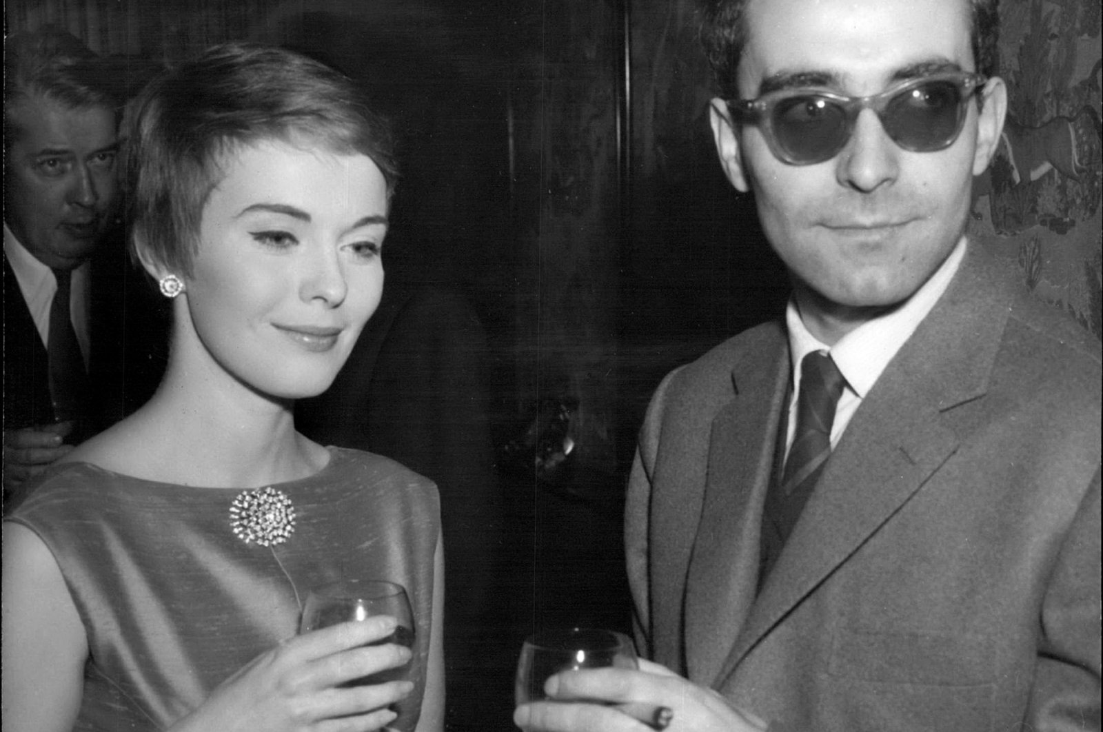 French filmmaker Jean-Luc Godard (R) and Jean Seberg toast with champagne at the release of his new film "A Bout De Souffle" (Breathless) in Paris, France, March 3, 1960. (dpa Photo)