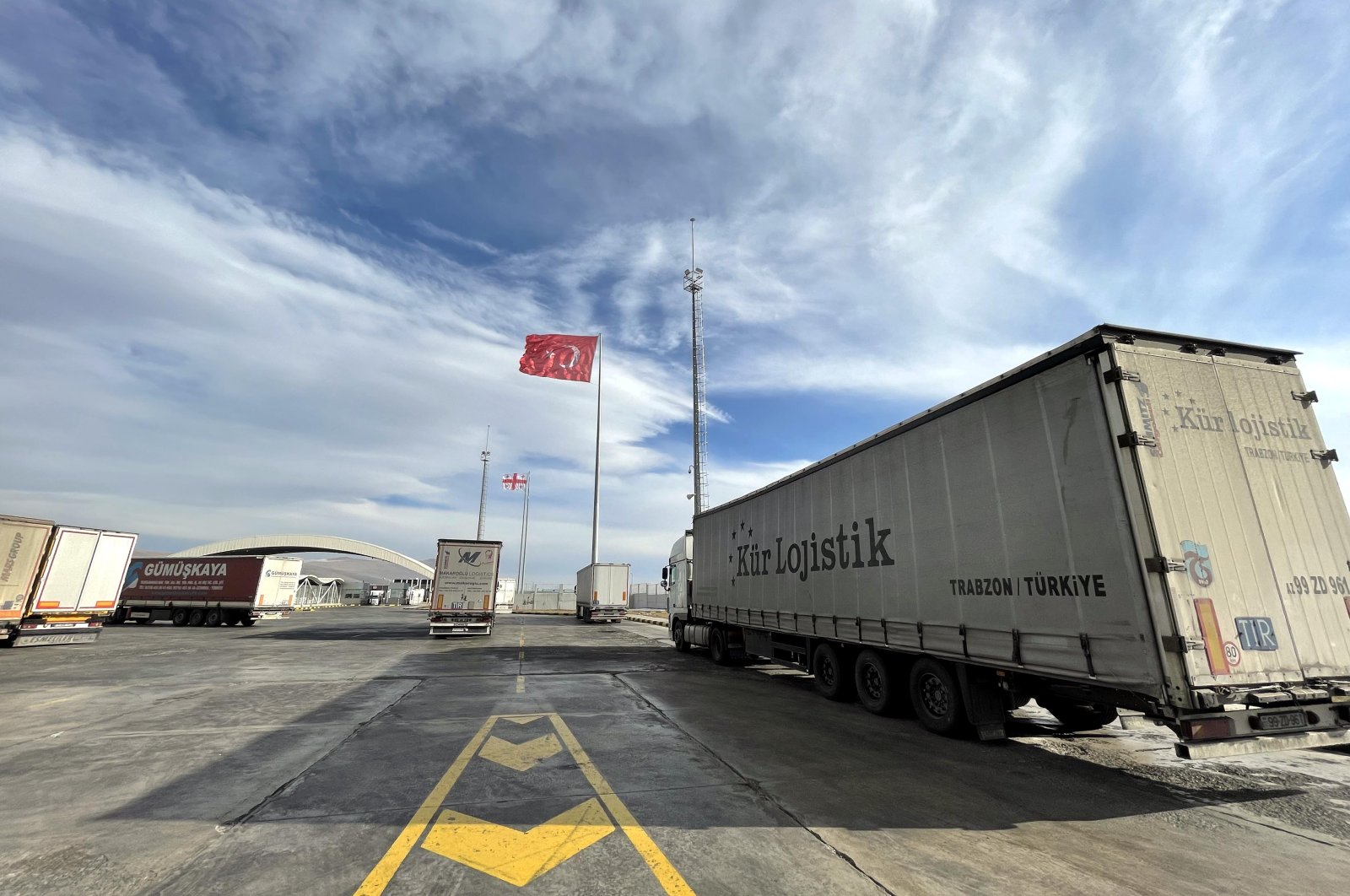 Trucks are seen at the Çıldır-Aktaş customs gate at Türkiye&#039;s border with Georgia in eastern Ardahan province, Dec. 15, 2021.