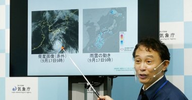 A director of the Japan Meteorological Agency's Forecast Division holds a press conference on Typhoon Nanmadol in Tokyo, Japan, Sept. 17, 2022. (AFP Photo)