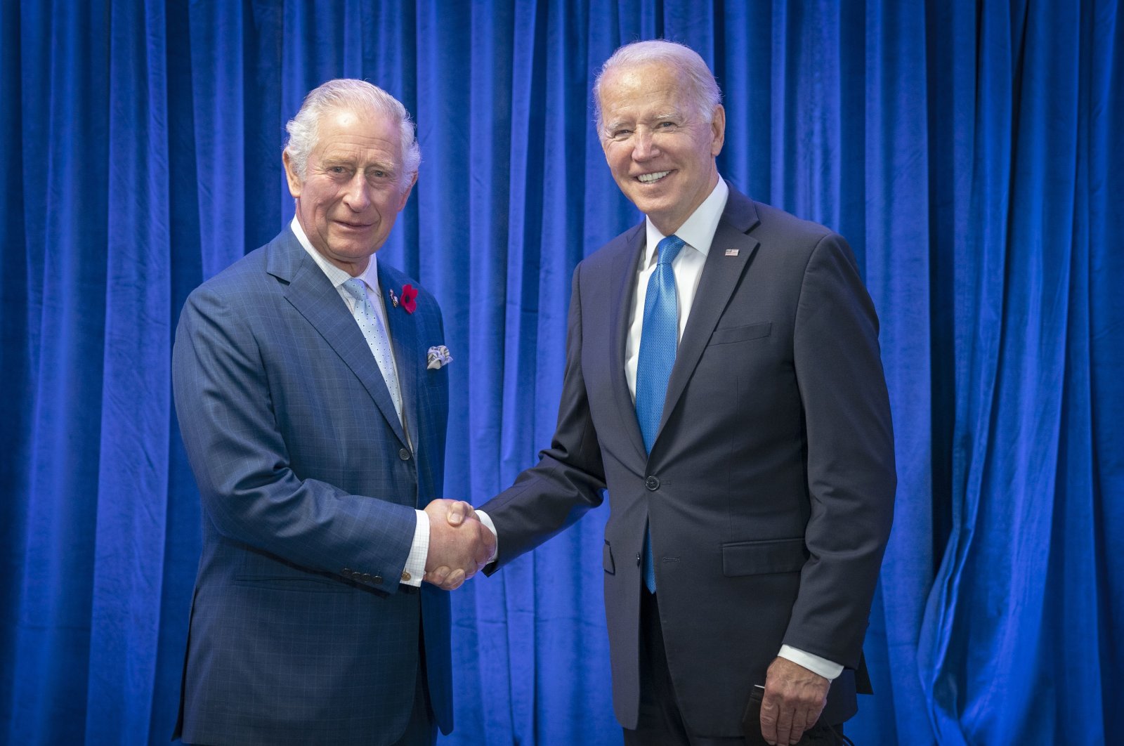 Britain&#039;s Prince Charles (L), greets the President Joe Biden ahead of their bilateral meeting during the COP26 summit at the Scottish Event Campus (SEC) in Glasgow, Scotland, Nov. 2, 2021. (AP Photo)
