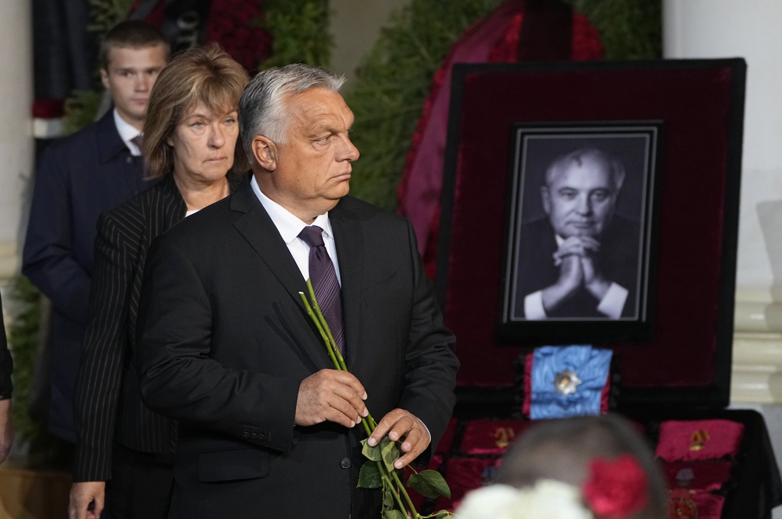 Hungarian Prime Minister Viktor Orban lays flowers on the coffin of the late former Soviet president Mikhail Gorbachev during a farewell ceremony at the Hall of Columns of the House of Trade Unions in Moscow, Russia, Sept. 3, 2022. (EPA Photo)