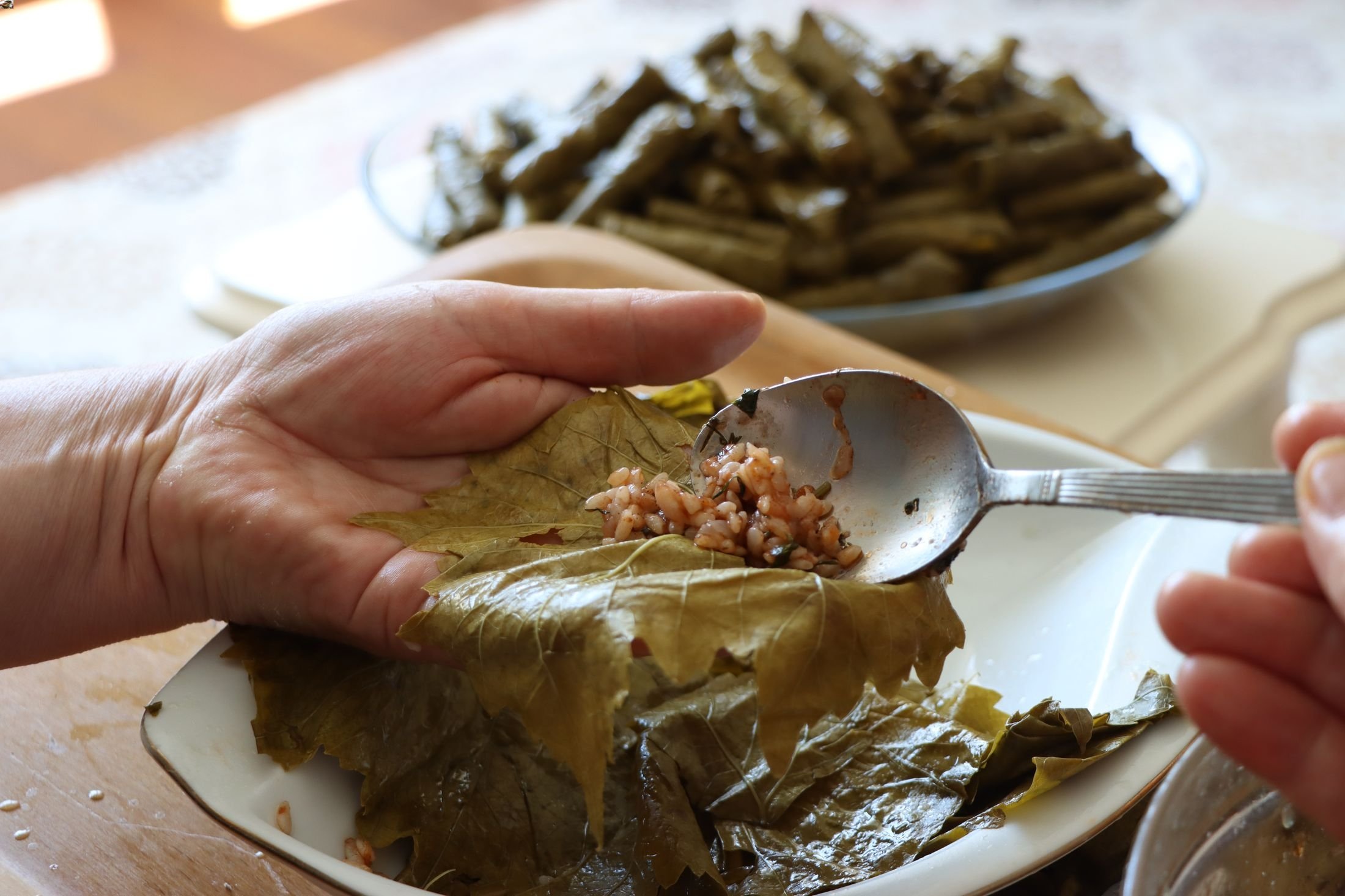 Sarma is a dish that can be prepared with a variety of stuffing, mainly bulgur or rice, and usually with grape leaves. (Shutterstock Photo)