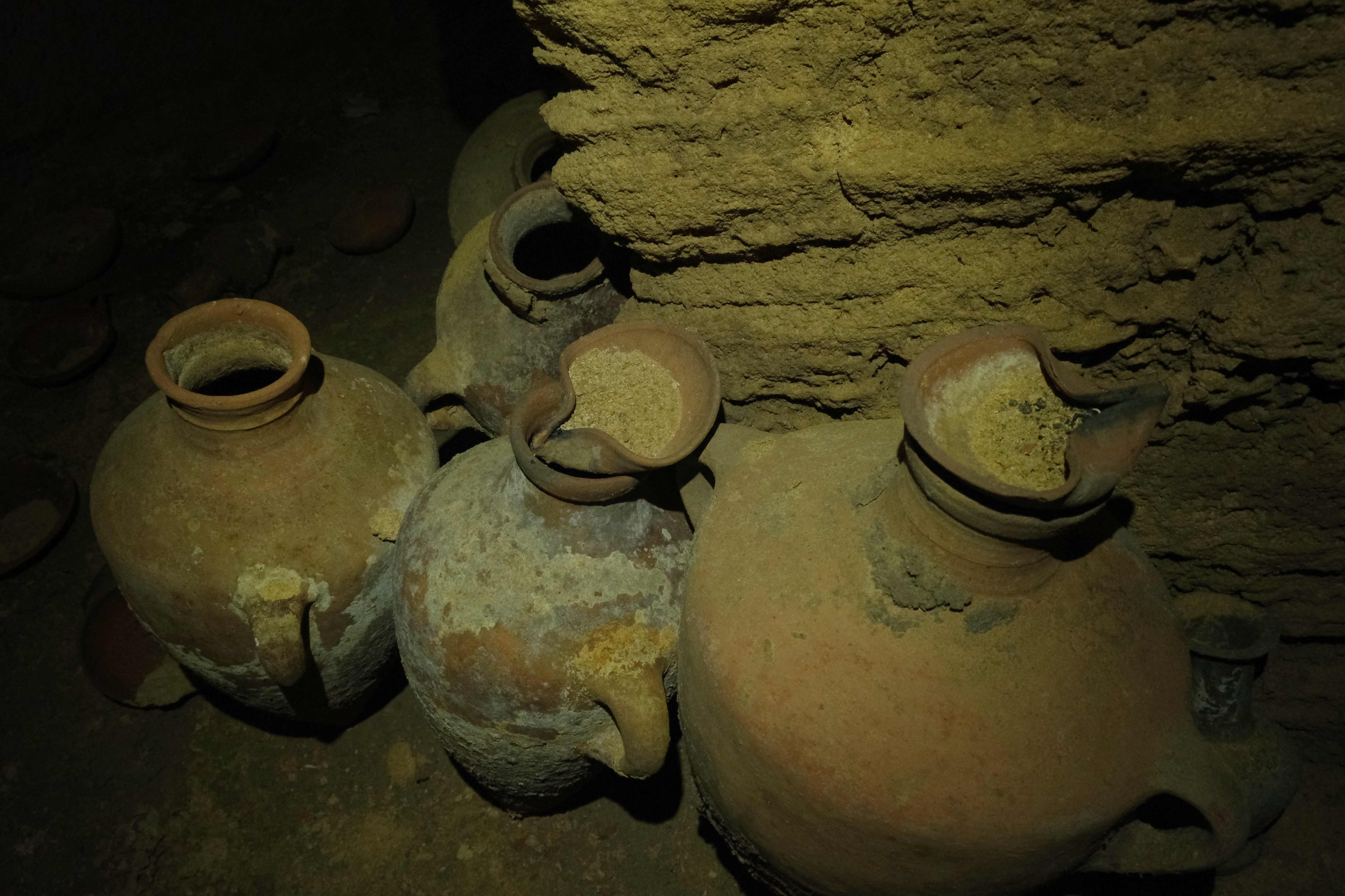 Finds including pottery vessels, in a funerary cave at the central Palmachim park area, Israel, Sept. 18, 2022. (Israeli Antiquities Authority via AFP)