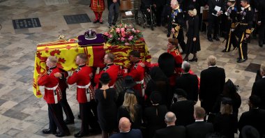 Britain's Queen Elizabeth's coffin is carried, as Britain's King Charles, Queen Camilla and Anne, Princess Royal follow, on the day of the state funeral and burial of Britain's Queen Elizabeth, at Westminster Abbey, London, England, Sept. 19, 2022. (Reuters Photo)