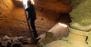 Finds including pottery vessels, in a funerary cave at the central Palmachim park area, on the Mediterranean coast, Israel, Sept. 18, 2022. (Israeli Antiquities Authority via AFP)