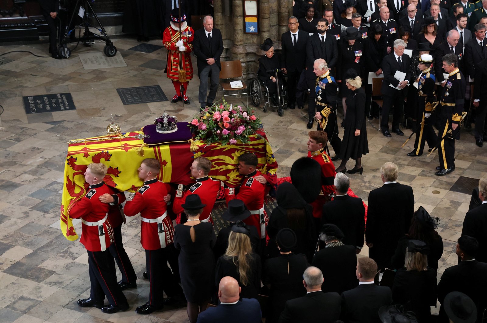 Britain&#039;s Queen Elizabeth&#039;s coffin is carried, as Britain&#039;s King Charles, Queen Camilla and Anne, Princess Royal follow, on the day of the state funeral and burial of Britain&#039;s Queen Elizabeth, at Westminster Abbey, London, England, Sept. 19, 2022. (Reuters Photo)