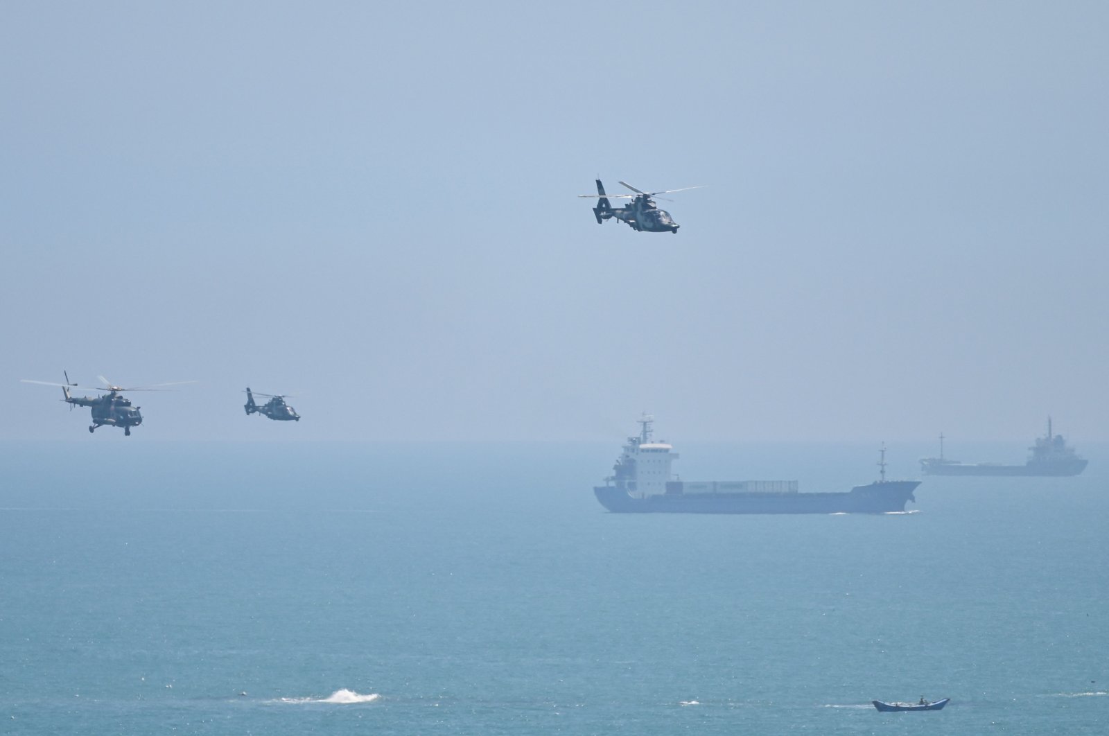 Chinese military helicopters fly past Pingtan island, one of mainland China&#039;s closest point, Aug. 4, 2022. (AFP Photo)