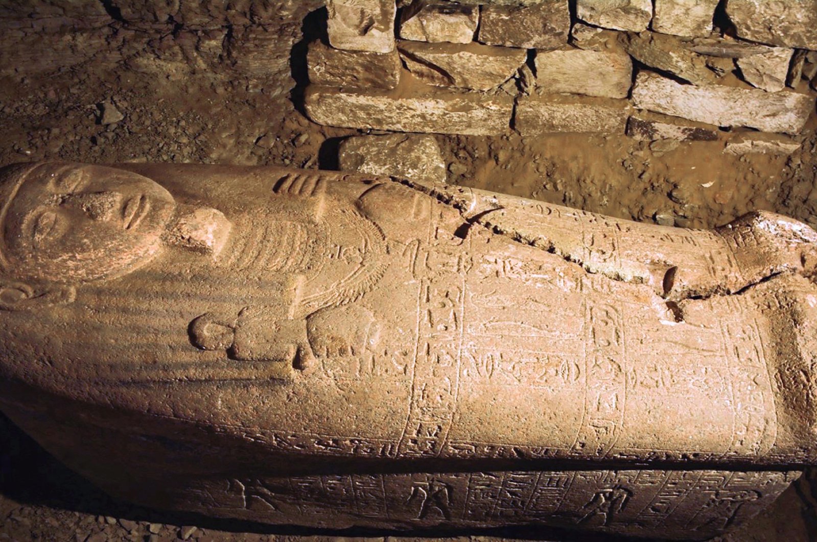 A pink granite sarcophagus belonging to a ranking government official during the reign of the ancient Egyptian New Kingdom Pharaoh Ramses II (1279–1213 B.C.), found by an Egyptian expedition at the tomb of Ptah-em-uya in Saqqara near the site of the Pyramid of Unas, is seen in this handout picture released by the Egyptian Ministry of Antiquities on Sept. 19, 2022. (Egyptian Ministry of Antiquities via AFP)