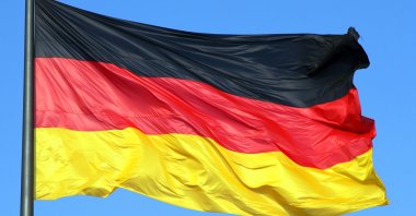 The German flag waving in the air. (Shutterstock)