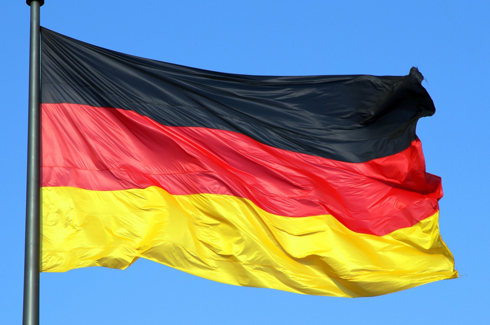 The German flag waving in the air. (Shutterstock)