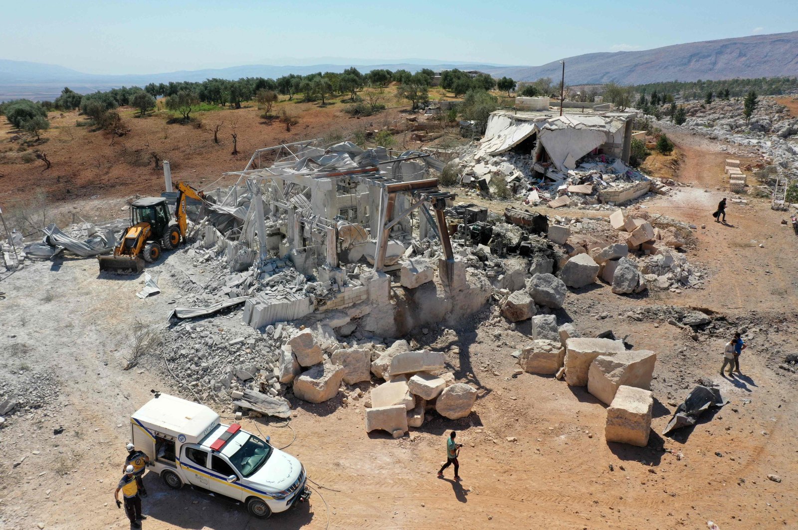 This aerial view shows the damage to buildings caused by a reported pro-regime forces bombing, in the Syrian opposition-held western countryside of Idlib, Syria, Sept. 8, 2022. (AFP Photo)