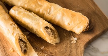 Börek rolls are often filled with minced meat or with cheese and spinach. But rice and vegetables also go well with the dough. (dpa Photo)