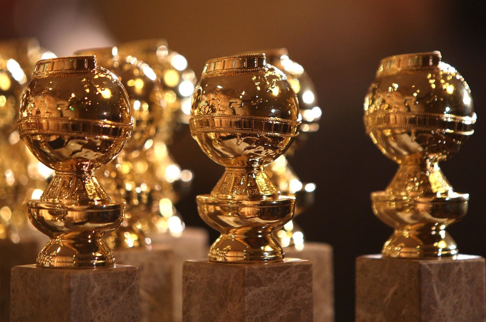 The new 2009 Golden Globe statuettes are on display during an unveiling by the Hollywood Foreign Press Association at the Beverly Hilton Hotel, California, U.S., Jan. 6, 2009. (Getty Images)