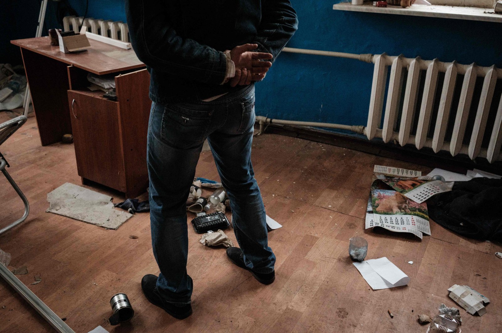 A man who has relatives in Russian-annexed Crimea talks in a room at the railway building where he says he was tortured by a militia in the so-called Luhansk People&#039;s Republic during Russia&#039;s occupation in March in the retaken town of Kozacha Lopan, Kharkiv region, Sept. 20, 2022. (AFP Photo)