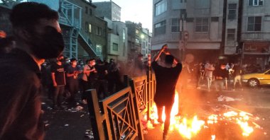 Iranian demonstrators taking to the streets of the capital Tehran, Iran, Sept. 21, 2022. (AFP Photo)