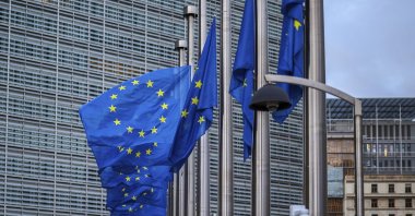 European Union flags flap in the wind at half mass outside EU headquarters in Brussels, Belgium, Sept. 9, 2022. (AP File Photo)