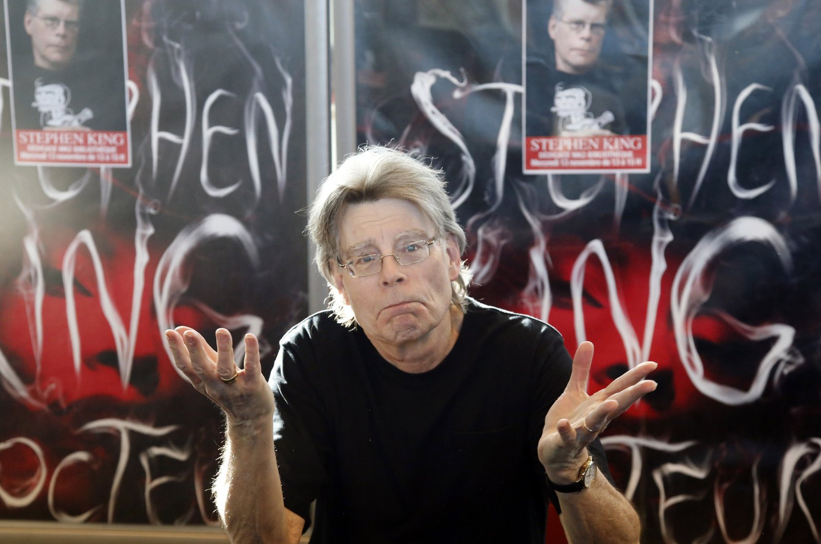 U.S. author Stephen King poses for the cameras during a promotional tour for &quot;Doctor Sleep,&quot; a sequel to &quot;The Shining,&quot; at a library in Paris, France, Nov. 13, 2013. (AP Photo)