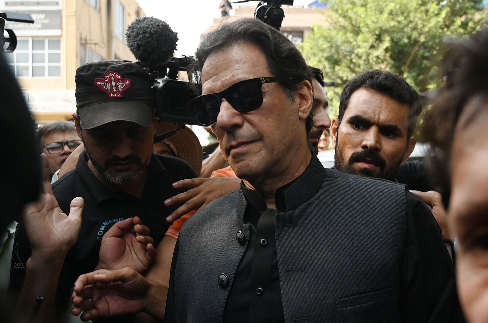Pakistan&#039;s former Prime Minister Imran Khan (C) arrives at the High Court, Islamabad, Pakistan, Sept. 22, 2022. (AFP Photo)