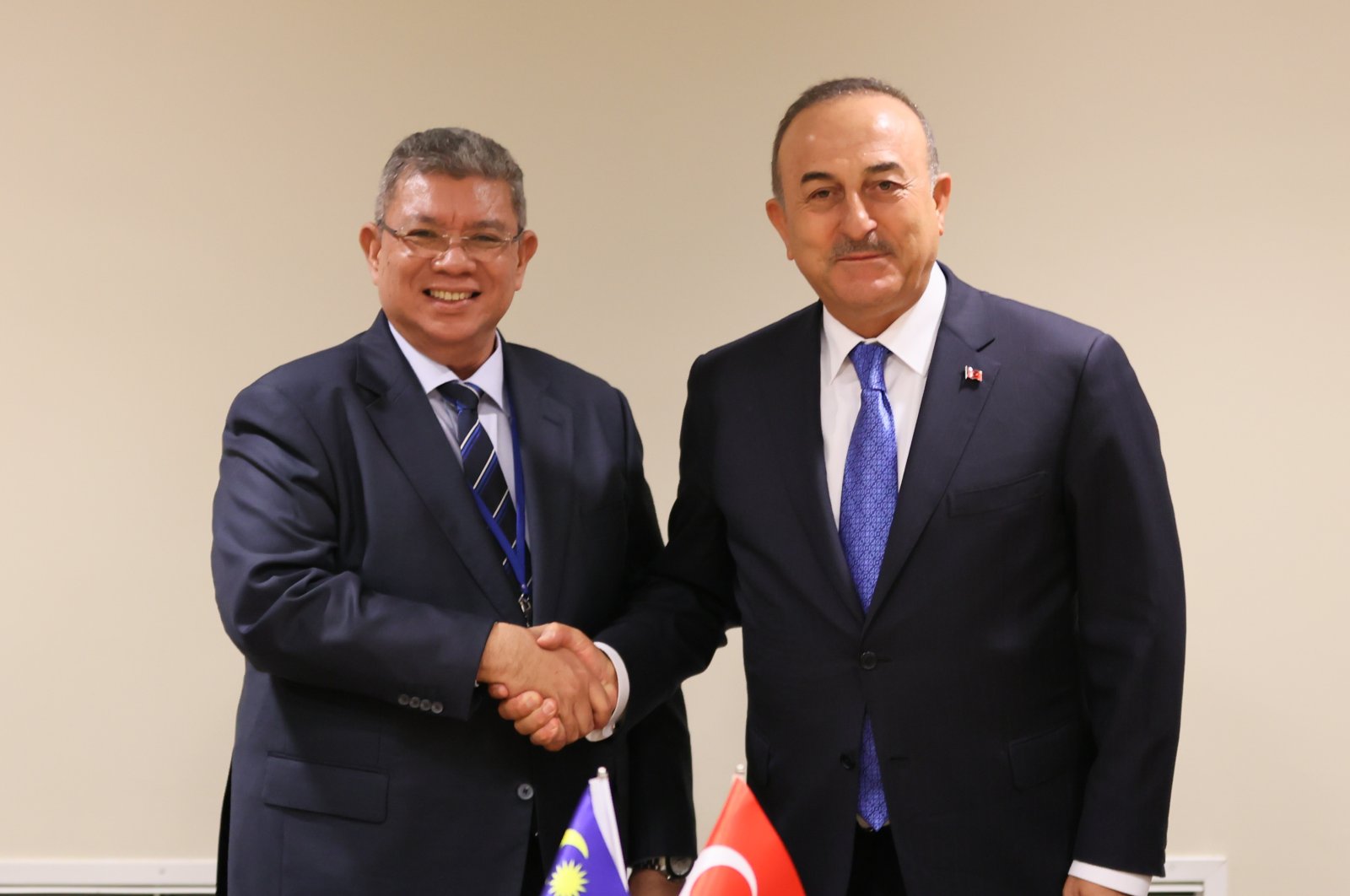 Foreign Minister Mevlüt Çavuşoğlu (R) meets with his Malaysian counterpart Saifuddin Abdullah in New York, U.S., Sept. 22, 2022. (AA)