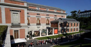 Visitors queue outside El Prado Museum in Madrid, Spain, July 21, 2021. (Reuters Photo)