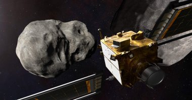 An artist&#039;s illustration shows the DART spacecraft from behind, prior to impact at the Didymos binary system, Nov. 4, 2021. (NASA via AFP)