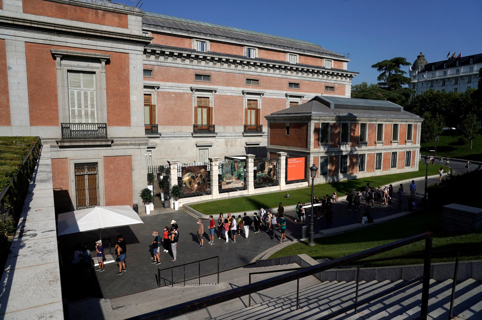 Visitors queue outside El Prado Museum in Madrid, Spain, July 21, 2021. (Reuters Photo)
