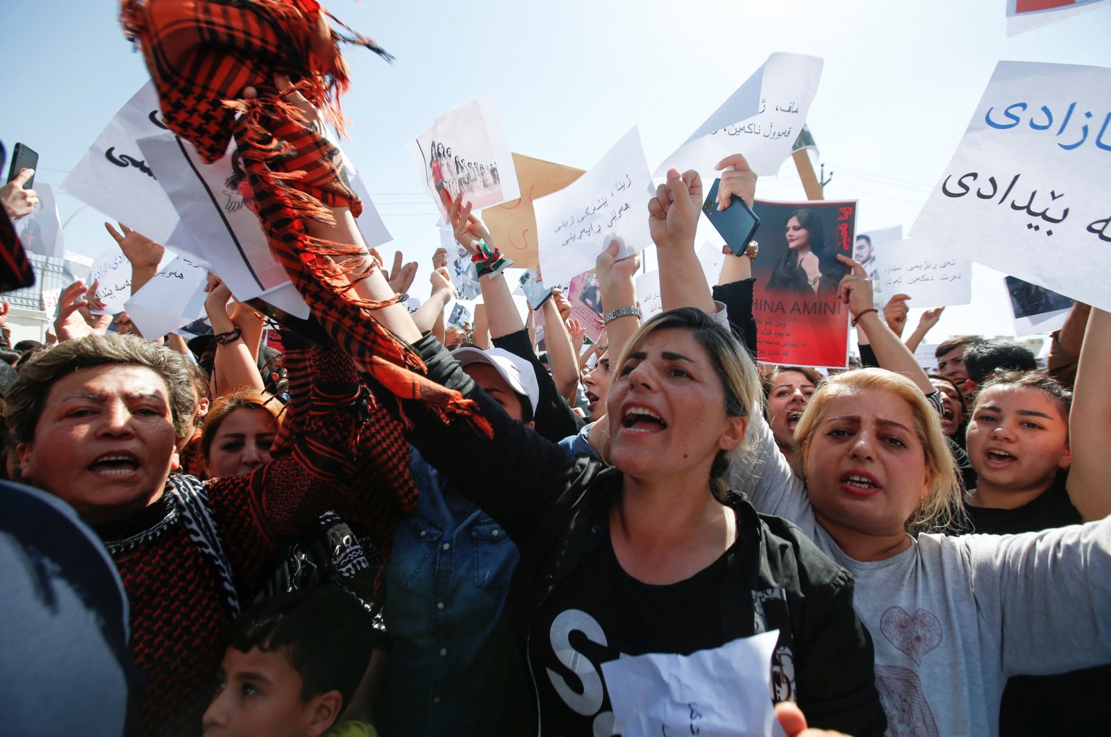People take part in a protest following the death of Mahsa Amini in front of the United Nations headquarters in Irbil, Iraq, Sept. 24, 2022. (Reuters Photo)
