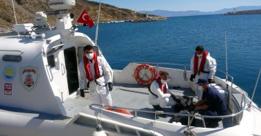 Turkish forces conduct a search and rescue operation to find irregular migrants in the Aegean Sea, Çanakkale, Türkiye, Sept. 24, 2022. (DHA)