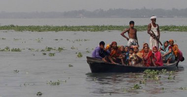 People look for victims of a ferry accident on the Meghna River, Munshiganj, Bangladesh, March 13, 2012. (AP Photo)