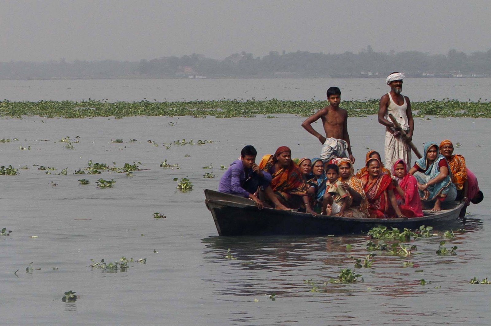 People look for victims of a ferry accident on the Meghna River, Munshiganj, Bangladesh, March 13, 2012. (AP Photo)