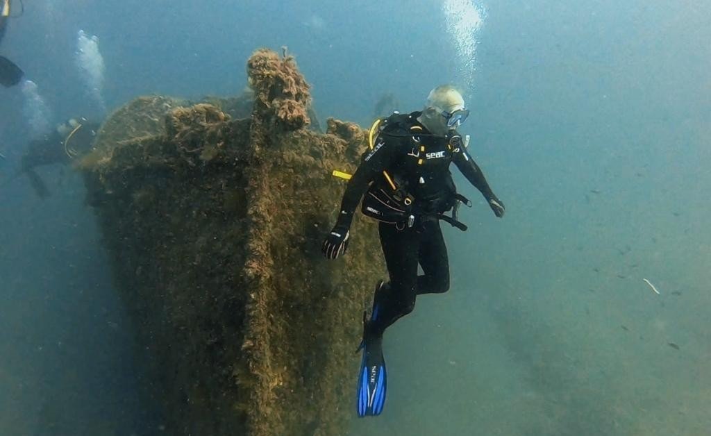 Culture Minister Mehmet Nuri Ersoy during the memorial dive aboard &quot;The Lundy&quot; at the Gallipoli Historical Underwater Park, Çanakkale, Türkiye, Sept. 29, 2022. (IHA Photo)