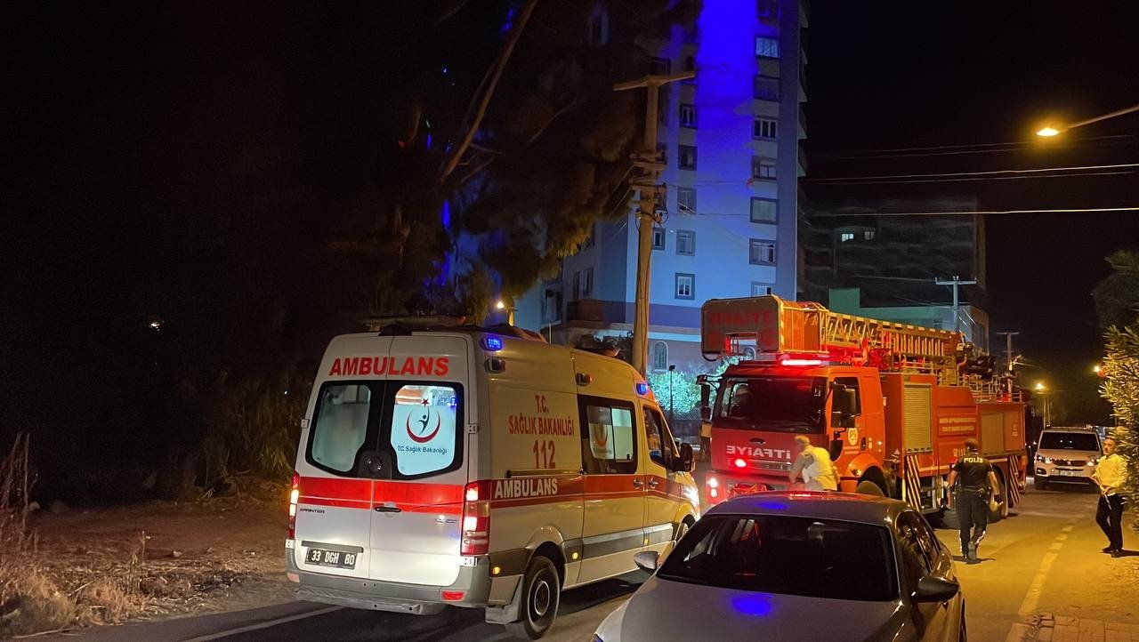 An ambulance and a fire engine are seen near the police hotel where the attack took place in Mersin, Türkiye, Sept. 26, 2022. (AA Photo)