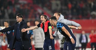 (L-R) Croatia&#039;s coach Zlatko Dalic, Croatia&#039;s midfielder Luka Modric, Croatia&#039;s defender Domagoj Vida and Croatia&#039;s forward Ivan Perisic celebrate after the UEFA Nations League, League A, Group 1 football match between Austria and Croatia in Vienna, Austria, Sept. 25, 2022.