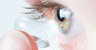 Anyone who wears reusable contact lenses should avoid wearing them while swimming, or in the shower, according to new research. (dpa Photo)