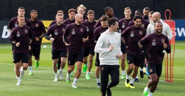 Germany players warm up during a training session at the DFB campus in Frankfurt am Main, western Germany, Sept. 20, 2022.