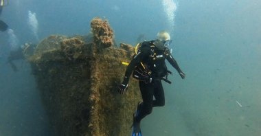 Culture Minister Mehmet Nuri Ersoy during the memorial dive aboard &quot;The Lundy&quot; at the Gallipoli Historical Underwater Park, Çanakkale, Türkiye, Sept. 29, 2022. (IHA Photo)