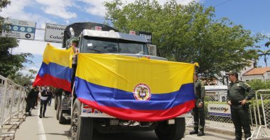 A truck bearing the Colombian flag crosses the Simon Bolivar international bridge during the official reopening of the border between Venezuela and Colombia, in Cucuta, Colombia, Sept. 26, 2022. (EPA Photo)