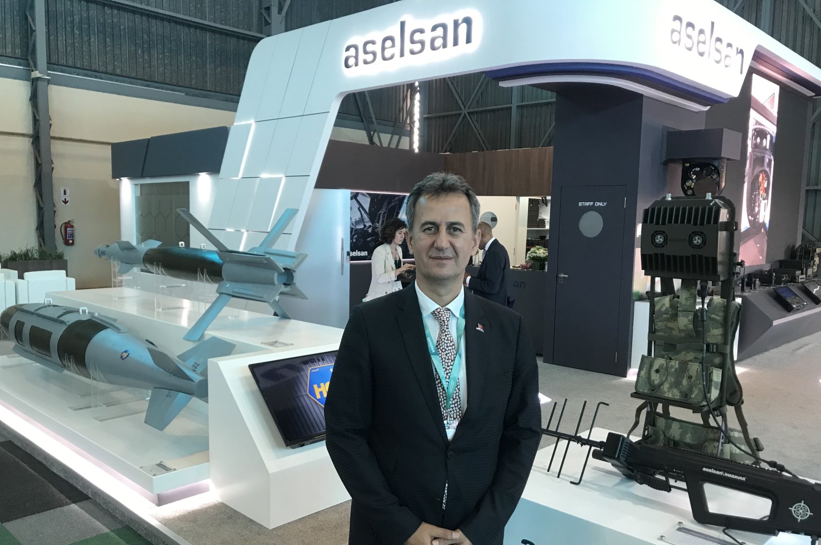 The company&#039;s CEO Haluk Görgün poses at Aselsan&#039;s booth in tje defense fair, in Pretoria, South Africa, Sept. 21, 2022. (AA PHOTO)
