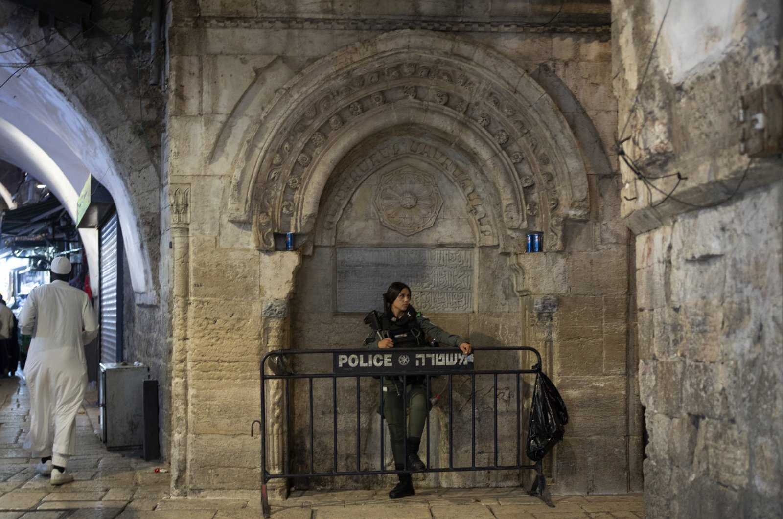 An Israeli border police officer stands at her post near the Al-Aqsa Mosque compound in the Old City of East Jerusalem that is under heightened security for Rosh Hashanah, the Jewish new year, occupied Palestine, Sept. 26, 2022. (AP Photo)