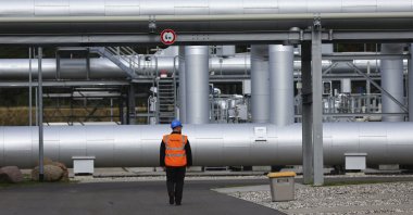 A security guard walks in front of the landfall facility of the Baltic Sea gas pipeline Nord Stream 2 in Lubmin, Germany, Sept. 19, 2022. (Reuters Photo)