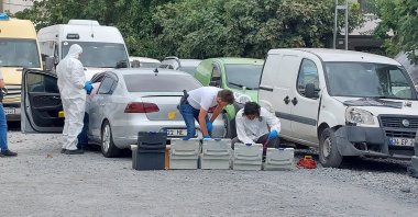Police investigate the scene of an armed attack, in Istanbul, Türkiye, Sept. 27, 2022. (İHA PHOTO) 