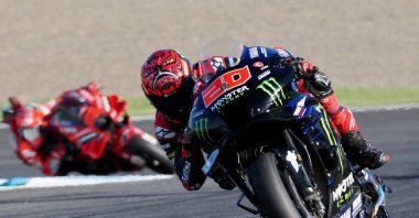 Fabio Quartararo of France rides his motorcycle during the MotoGP class race at the Japanese Grand Prix, Mie, Japan, Sept. 25, 2022. (AFP Photo)