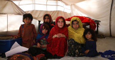 Children sit in a tent, in Paktika, Afghanistan, Sept. 24, 2022. (AA PHOTO) 