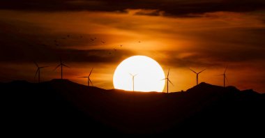 Wind turbines are seen during sundown in the Gevaş district of eastern Van province, Türkiye, March 6, 2021. (AA Photo)