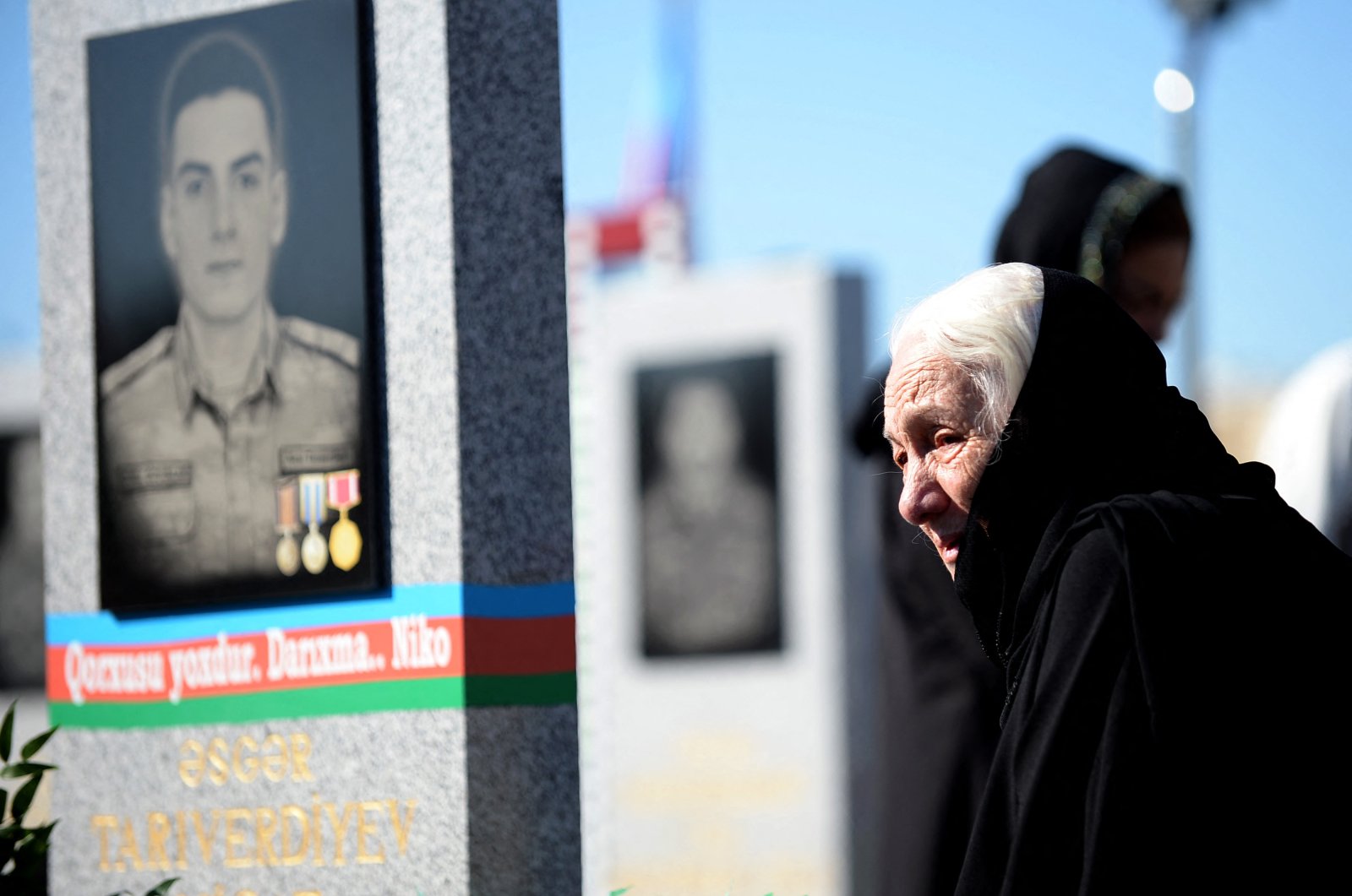 Relatives and friends of soldiers killed in six weeks of fighting for control of the disputed Nagorno-Karabakh region visit a military cemetery in Baku on the second anniversary of the conflict, Azerbaijan, Sept. 27, 2022. (AFP Photo)