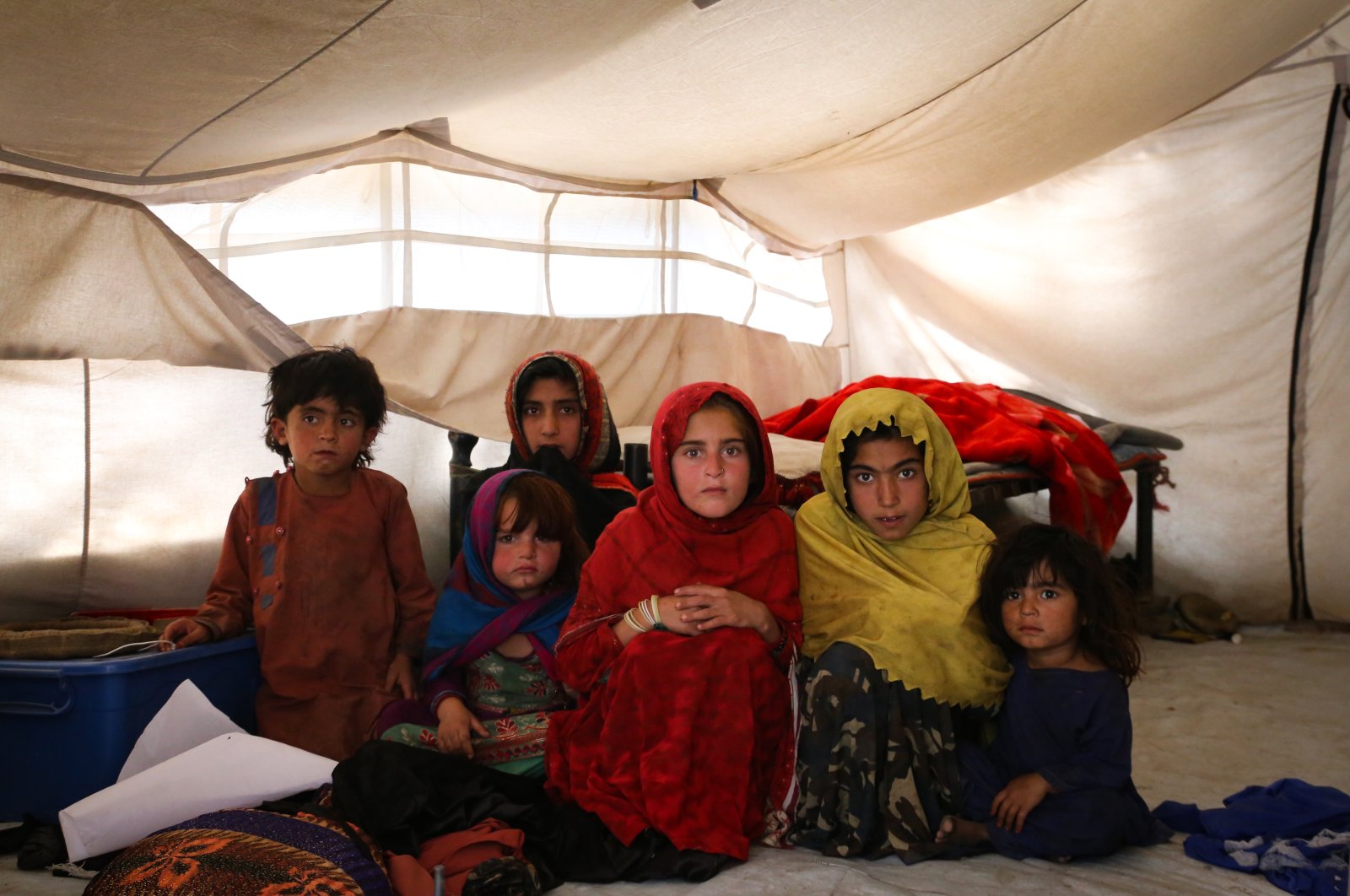Children sit in a tent, in Paktika, Afghanistan, Sept. 24, 2022. (AA PHOTO) 